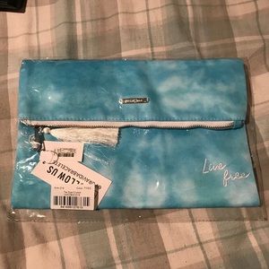 2 brand new pura vida large clutches/make up bags